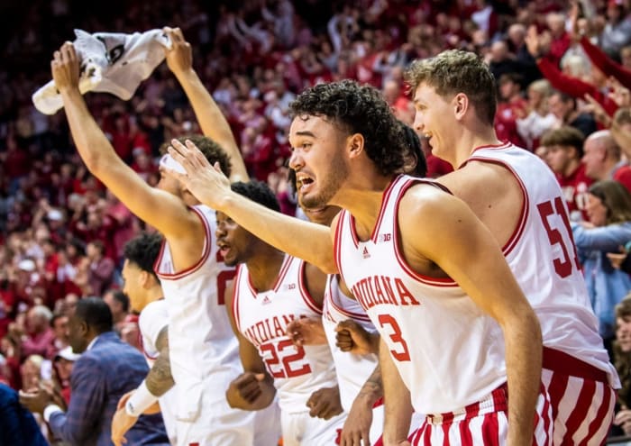 Indiana's Anthony Leal (3) and the bench celebrate a Miller Kopp (12) dunk during the second half of the Indiana versus Michigan State.